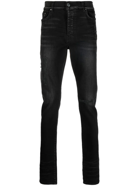 AMIRI skinny jeans con logo bordado