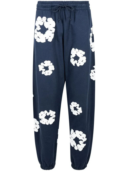 Denim Tears pants con estampado Cotton Wreath